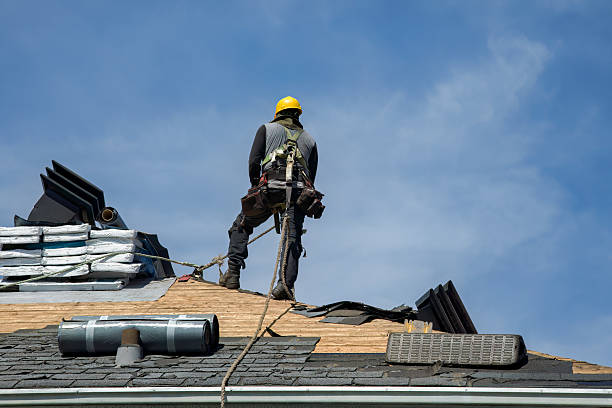 Professional Storm Damage Roof Repair technician working in Grassflat, PA